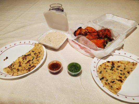 Tandoori chicken, garlic Naan, seasoned basmati rice, dipping sauces