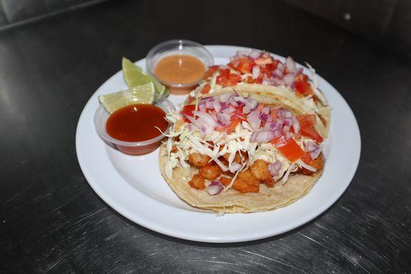 Fish Taco's with Veggies with our house made dressing and sauce.