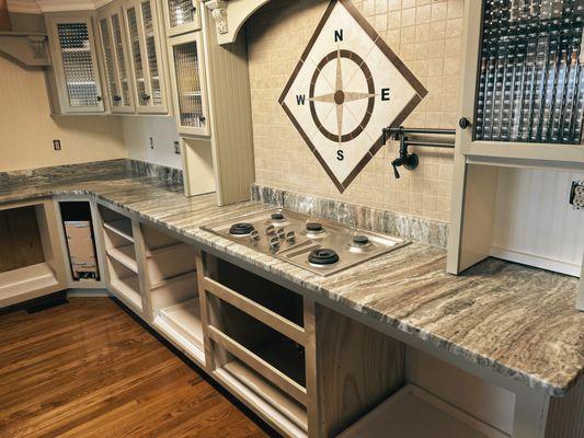 Fantasy Brown Kitchen Countertop with Cooktop Cut Out cut and installed by MGL Granite