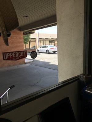 Parking lot in small lot between buildings