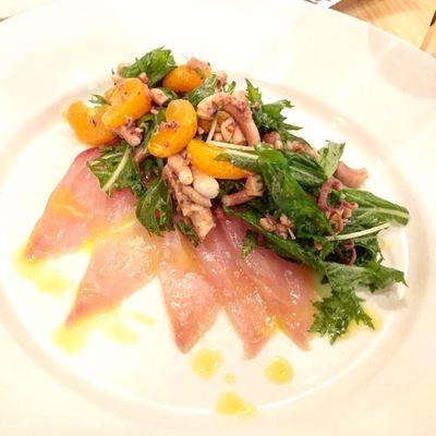 Olive oil braised octopus, roasted jack mackerel, tangerine agrumato, orange, mustard greens