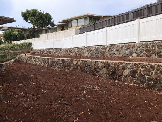 Retaining rock wall/tier and steps with vinyl fence and gate (after)