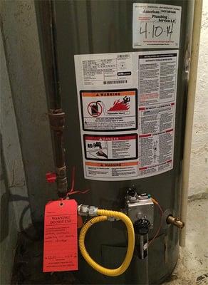 This was a "red tagging." The gas company deemed the new water heater, installed by American Plumbing Services, dangerous to use.