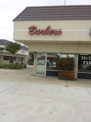 Vintage 70's style shop. Great haircuts with  lots of old fashioned conversation