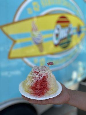 Shave ice with vanilla soft serve base, strawberry/mango/pineapple syrup and condensed milk snow cap