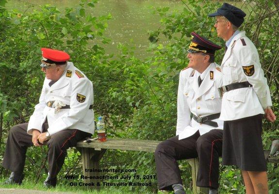 These three "officers" watch a re-enactment skit at Rynd Station on the July 17, 2017 WWII re-enactment by the OC&T Railroad. @OCandT