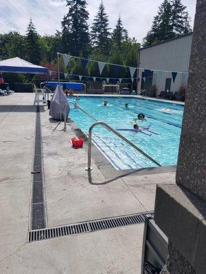 open air swimming pool during summer months allows 2 laps open for adult exercise swimming