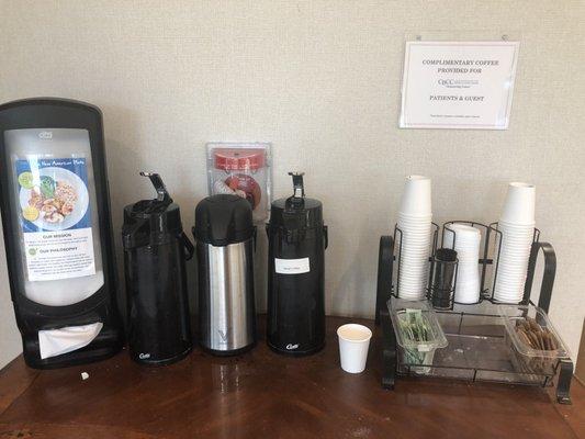 Complimentary coffee.  I didn't get any because I didn't see creamer.