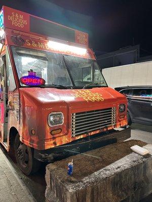 S&M Delicious Foods truck parked outside of Brooklyn Mirage