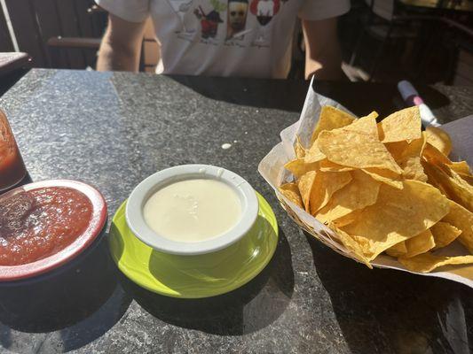 Chips, cheese dip, and salsa