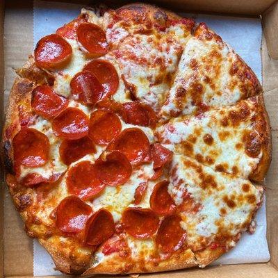 Large 8-cut half cheese half pepperoni pizza from Charley's Place. Delicious!