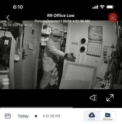 Burglar taking his time! No alarm sounding. My cheap ass camera notified me of motion in my office!!!