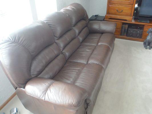 20+ years old Hayek's dual reclining sofa