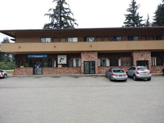 Domino's Pizza is on the first floor of one of the hotel buildings