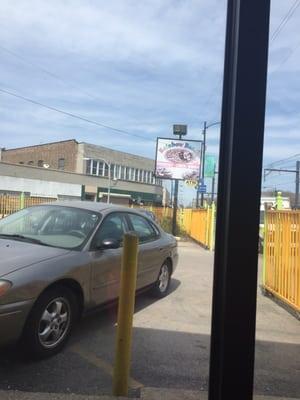 The sign. The entire gate is painted yellow.