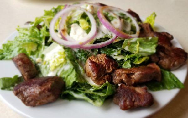 Greek salad with steak tips