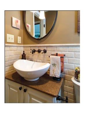 Wall mounted faucets and subway tile backsplash