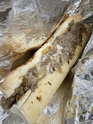 Philly Cheesesteak with American cheese, grilled onions & extra Pepper Jack cheese (don't think they gave the Pepper Jack)