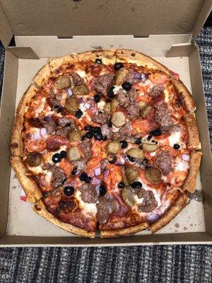 Pepperoni, sausage, meatball, red onion, black olive and tomato. Wow.