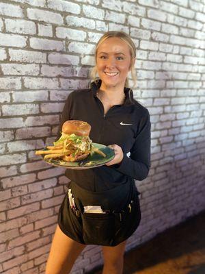 Brooke hold our delicious Food Truck Burger .