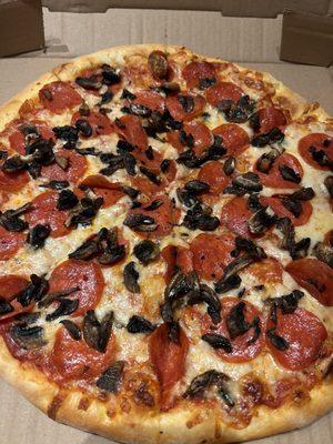 Pepperoni and mushroom pizza