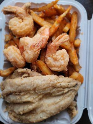 Lunch special. Shrimps, fries and fish