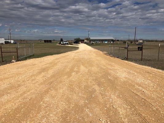 Gravel entrance 60' width. Good for accessing larger vehicles, RVs, trailers.