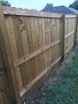 A wood fence we created