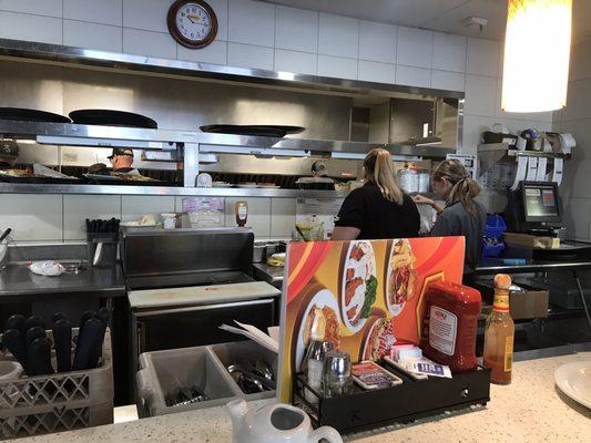 Waitresses and grill area