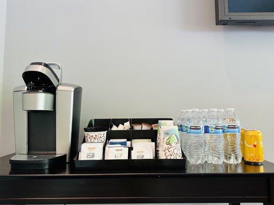 Enjoy a water, tea, coffee, or sparkling water at our beverage station