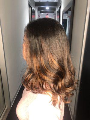 February 2020. Hair: ombré balayage medium length, curls. Profile view