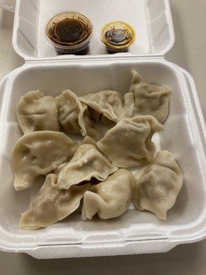 5 steam-fried pork dumplings and 5 steam-fried chicken dumplings