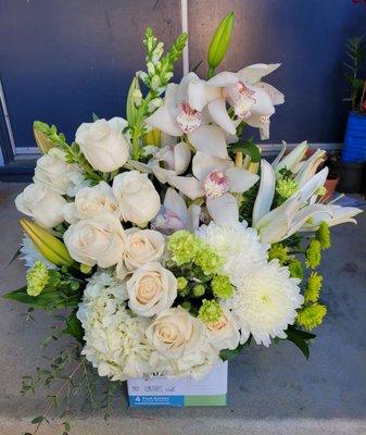 White lilies,  roses and orchids