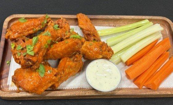 Chicken Wings served with Carrots and Celery (Hot, Medium, Mild, Teriyaki, Lemon Pepper, BBQ)