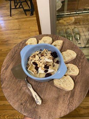 Baked Brie with cranberries, almonds and local honey.