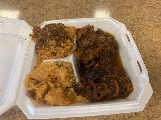 Oxtails.  Rice and peas and cabbage.  Just amazingly good.  True Carribean flavor.