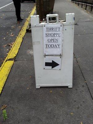 Our sandwich-board sign on the sidewalk outside of the Church and Shoppe