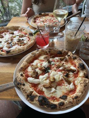 Eggplant ricotta pizza, margarita pizza, wine, cocktail, iced latte