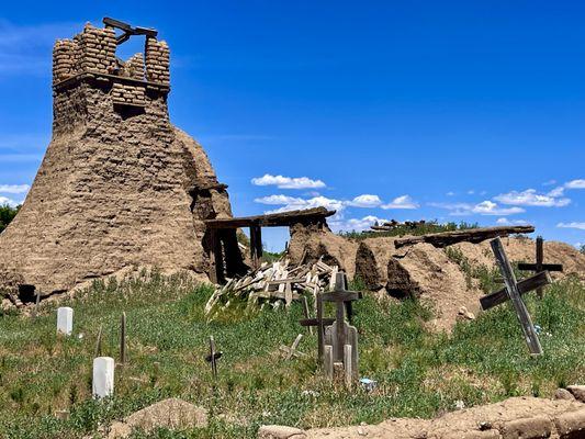 Remnants of the bell tower are all that remain of the old church.  Quite a history.