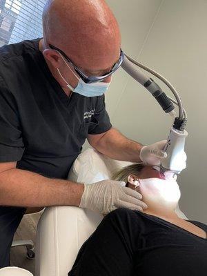 Dr. Sherman performing a Fraxel procedure.