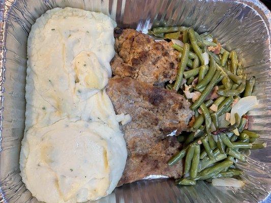 Pork tenderloin with charred pineapple/pepper salsa, sour cream/chive mashed potatoes and garlic green beans.