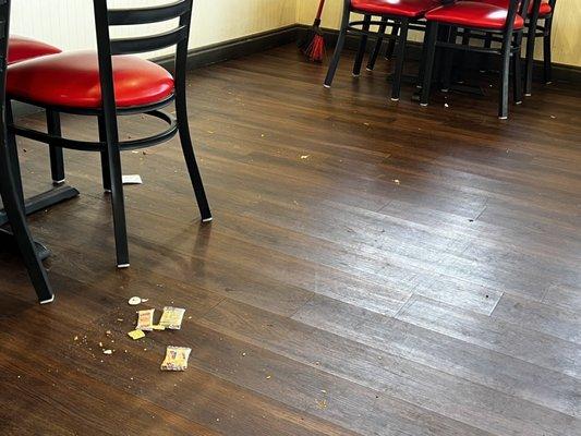 Old crackers on floor where I sat.