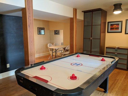 Activity room with air hockey table