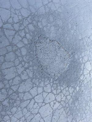 Cold patch in pothole