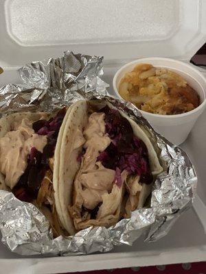 Pulled chicken taco with slaw, special sauce, and barbecue sauce with Mac&Cheese