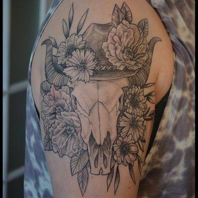 Custom cow skull with western flowers memorial tattoo