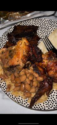 Chicken and ribs with rice and beans splits from the 1/2 chicken platter and the rib platter.