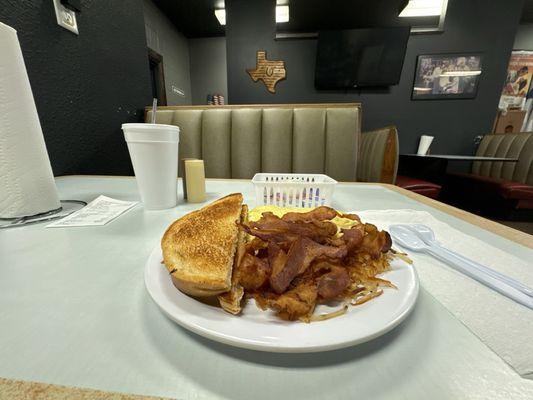 Sausage & cheese omelette, sourdough toast, hash browns, a side of bacon