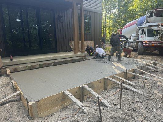 Team in the middle of pouring the patio!