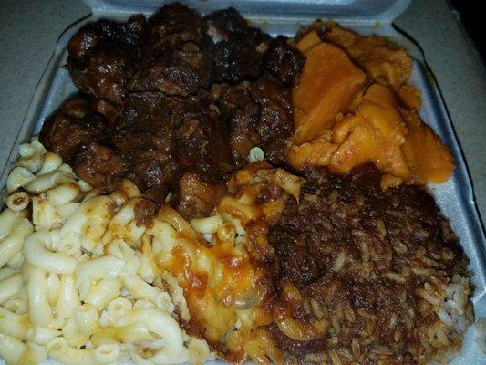 LARGE Oxtail Platter with Rice and Peas and Yams and Baked Mac n Cheese. YUMMY.